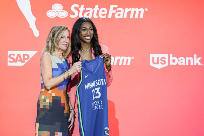 WNBA Commissioner Cathy Engelbert poses with Diamond Miller poses for a photo.